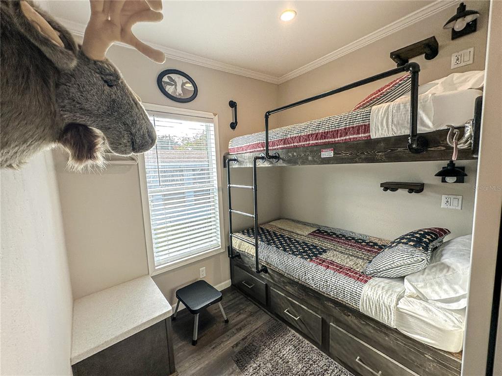 107 Long Hammock Drive River Ranch, FL 33867 - Photo 12 of 21 a bathroom with a bathtub and a window