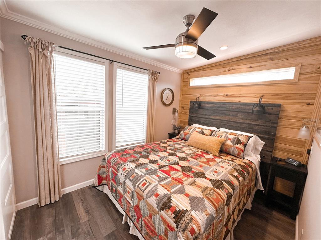 107 Long Hammock Drive River Ranch, FL 33867 - Photo 14 of 21 a bedroom with a bed and a window