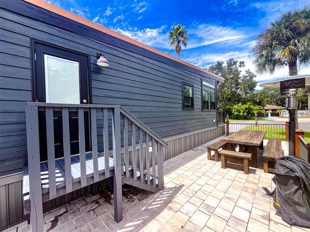 107 Long Hammock Drive River Ranch, FL 33867 - Photo 16 of 21 a view of a chairs and table in the balcony