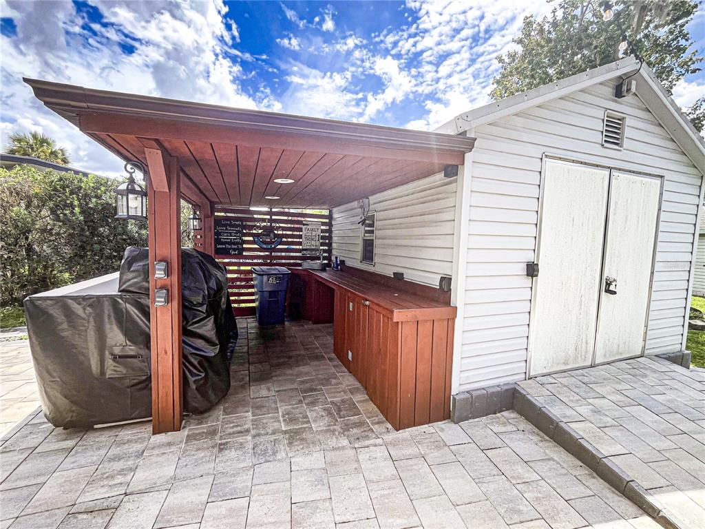 107 Long Hammock Drive River Ranch, FL 33867 - Photo 17 of 21 a view of a patio with table and chairs
