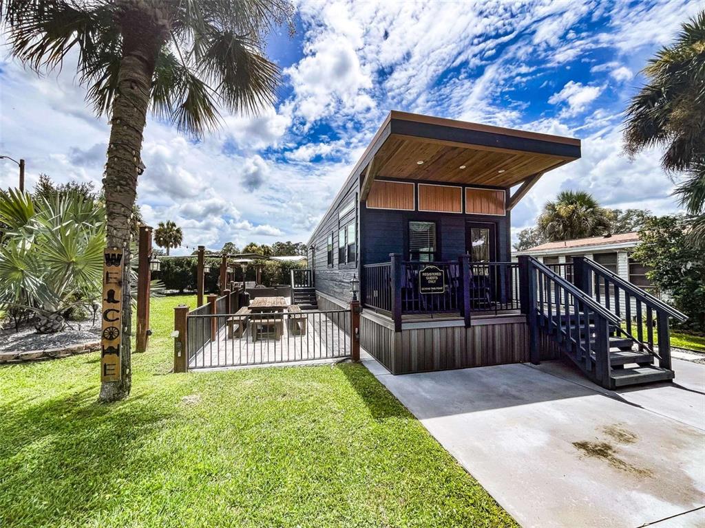 107 Long Hammock Drive River Ranch, FL 33867 - Photo 2 of 21 a view of a house with a patio