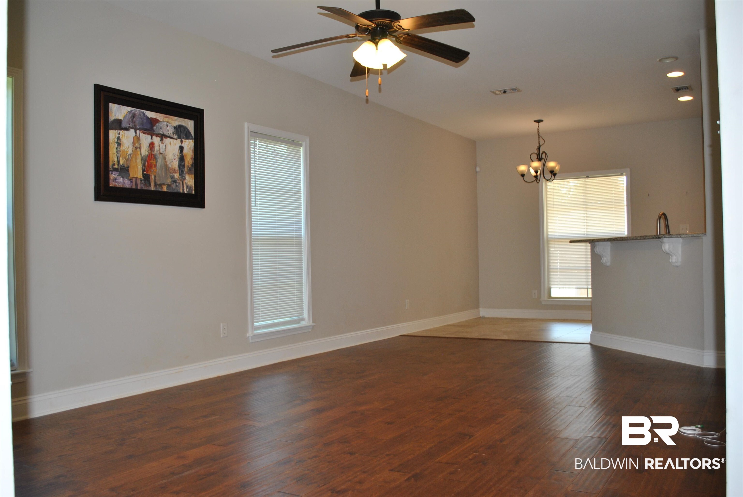 2161 Spring Grove West Mobile, AL 36695 - Photo 6 of 31 Unfurnished room featuring a chandelier, wood finished floors, ceiling fan, and recessed lighting
