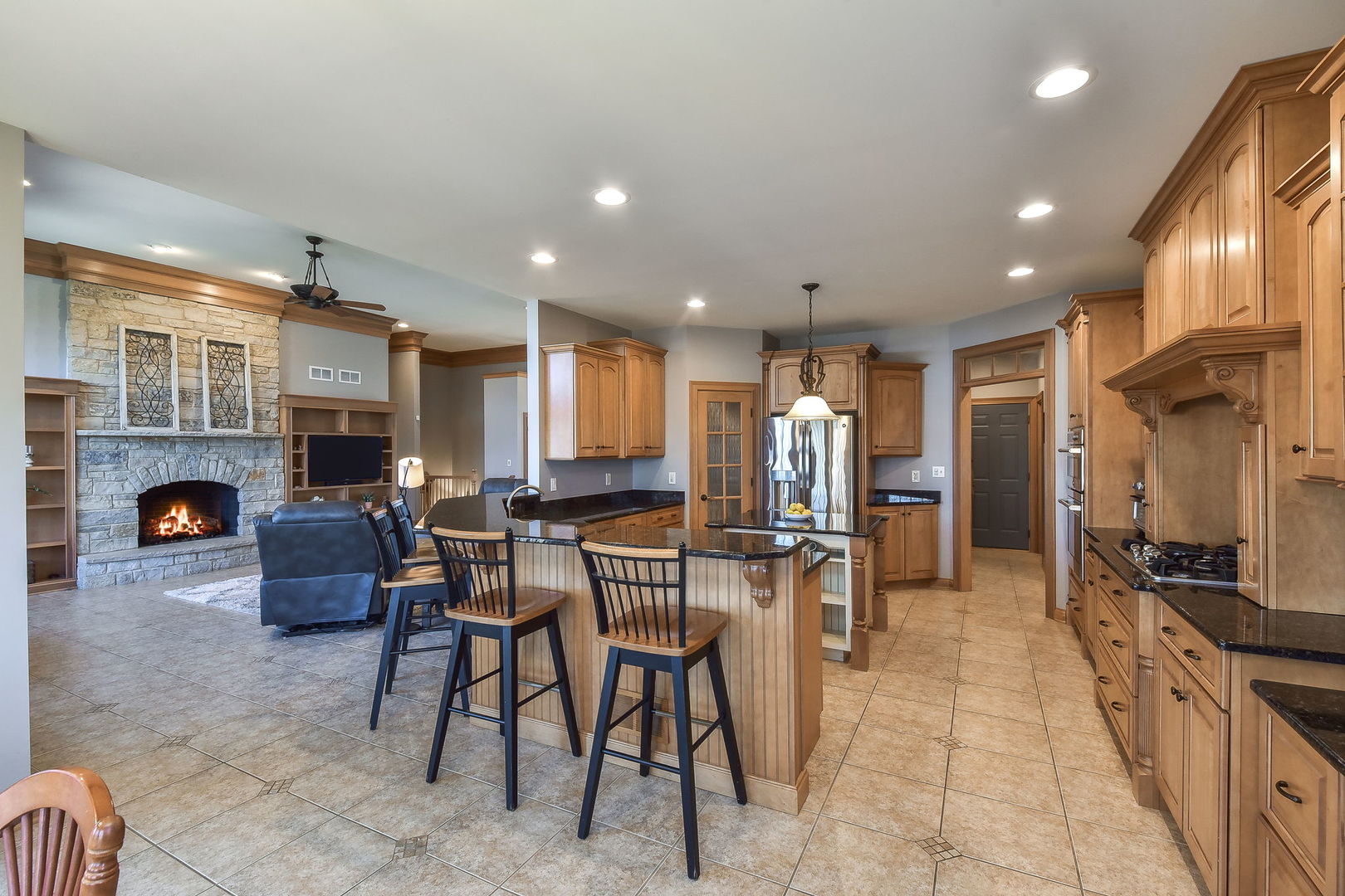 1737 Hunters Ridge Lane Sugar Grove, IL 60554 - Photo 12 of 50 a living room with furniture and a fireplace
