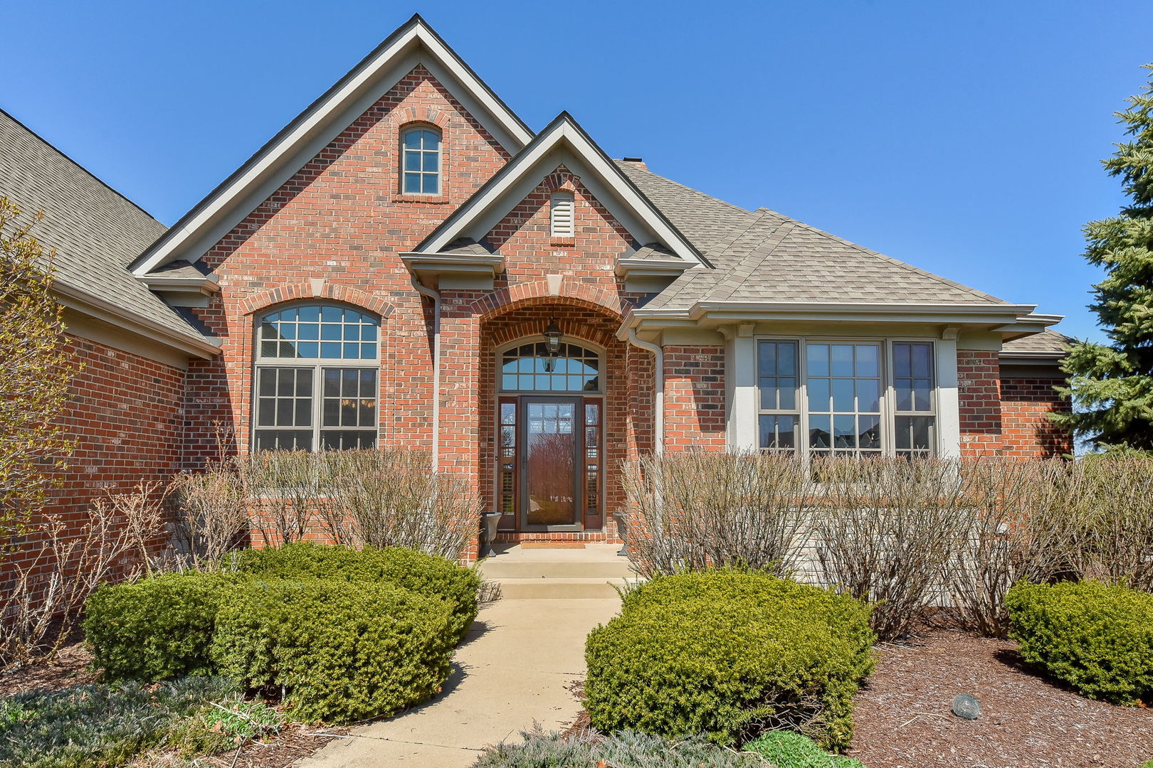 1737 Hunters Ridge Lane Sugar Grove, IL 60554 - Photo 2 of 50 front view of a house with a small yard
