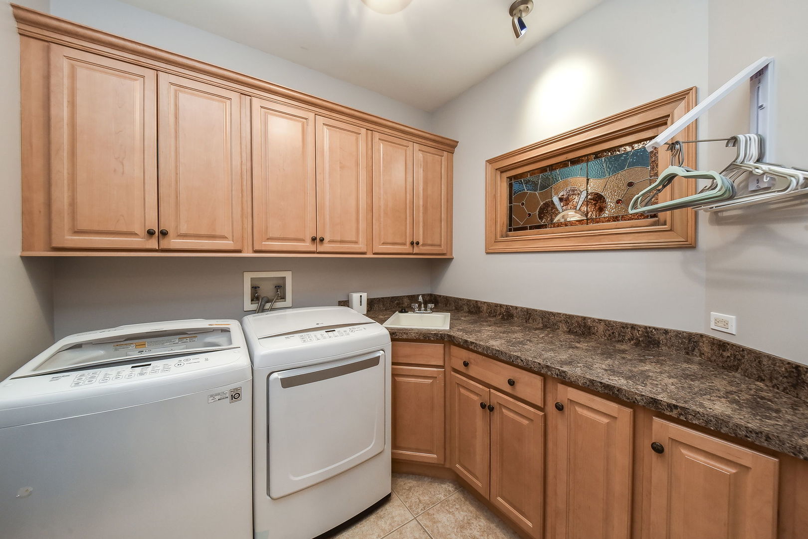 1737 Hunters Ridge Lane Sugar Grove, IL 60554 - Photo 26 of 50 a utility room with stainless steel appliances granite countertop cabinets and window
