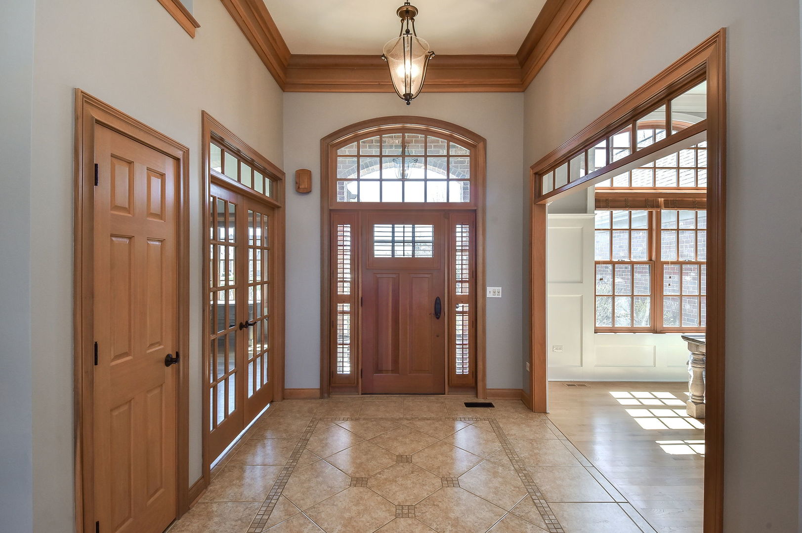 1737 Hunters Ridge Lane Sugar Grove, IL 60554 - Photo 3 of 50 an empty room that has a large window and front door