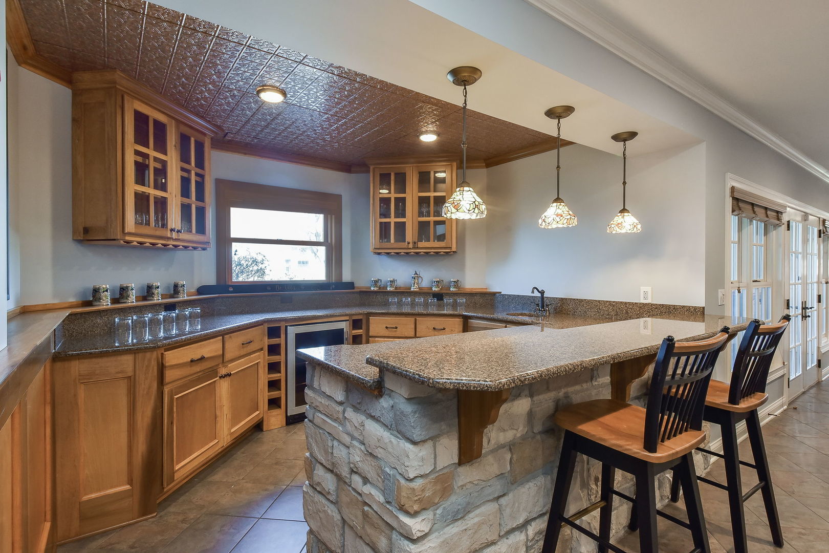 1737 Hunters Ridge Lane Sugar Grove, IL 60554 - Photo 31 of 50 a kitchen with a stove a sink and a refrigerator