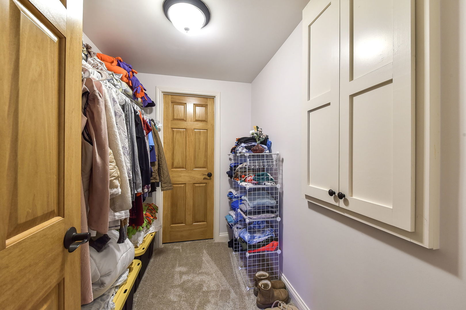 1737 Hunters Ridge Lane Sugar Grove, IL 60554 - Photo 37 of 50 a view of a closet with storage