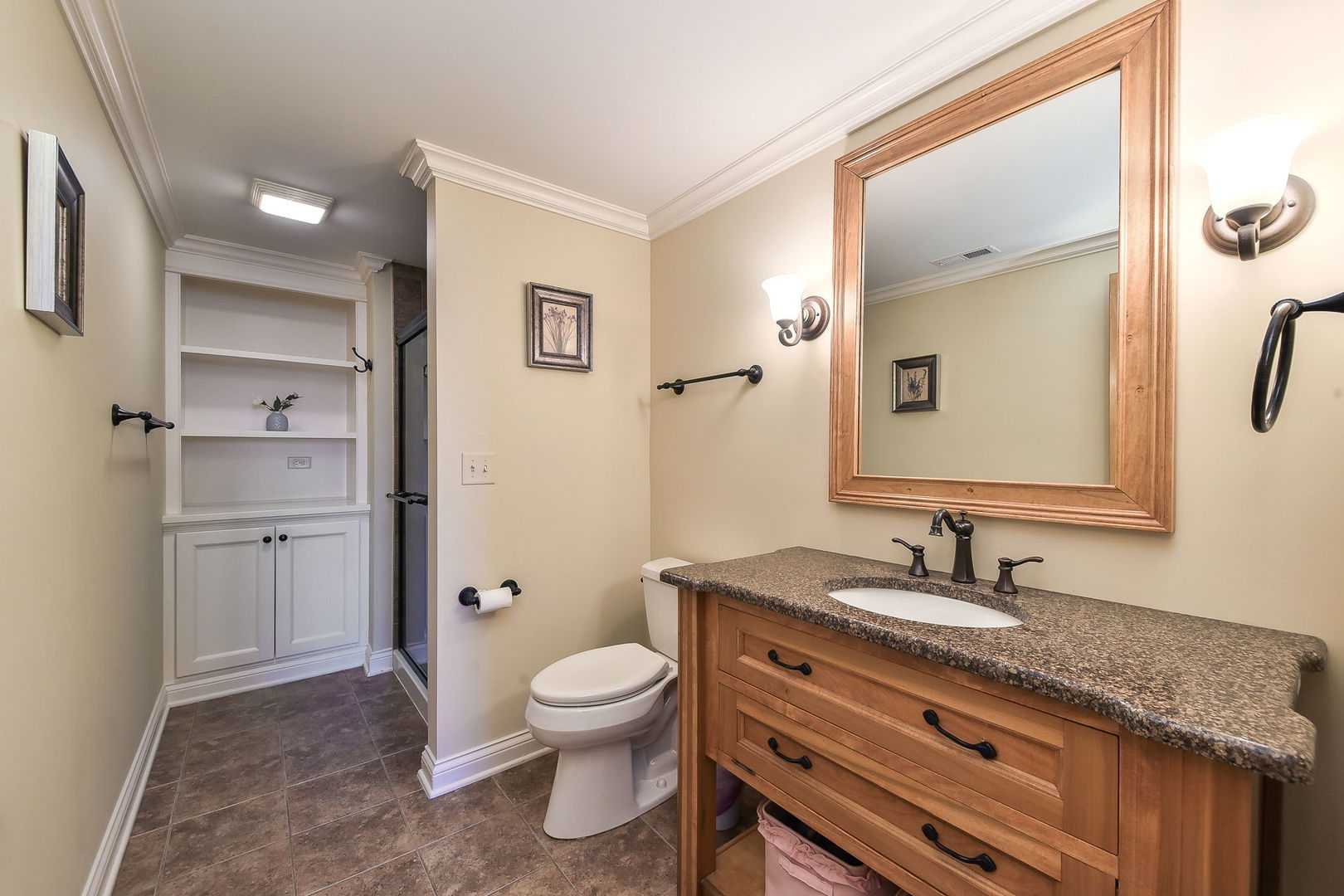 1737 Hunters Ridge Lane Sugar Grove, IL 60554 - Photo 39 of 50 a bathroom with a granite countertop toilet sink and mirror