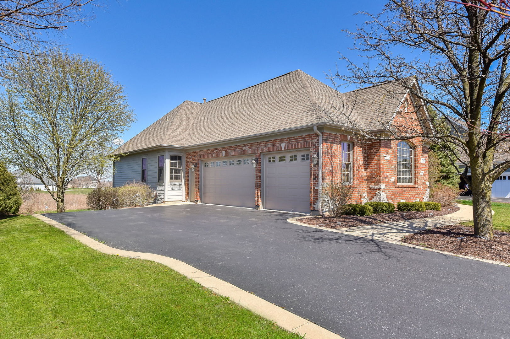 1737 Hunters Ridge Lane Sugar Grove, IL 60554 - Photo 50 of 50 a view of a house with a yard and large tree