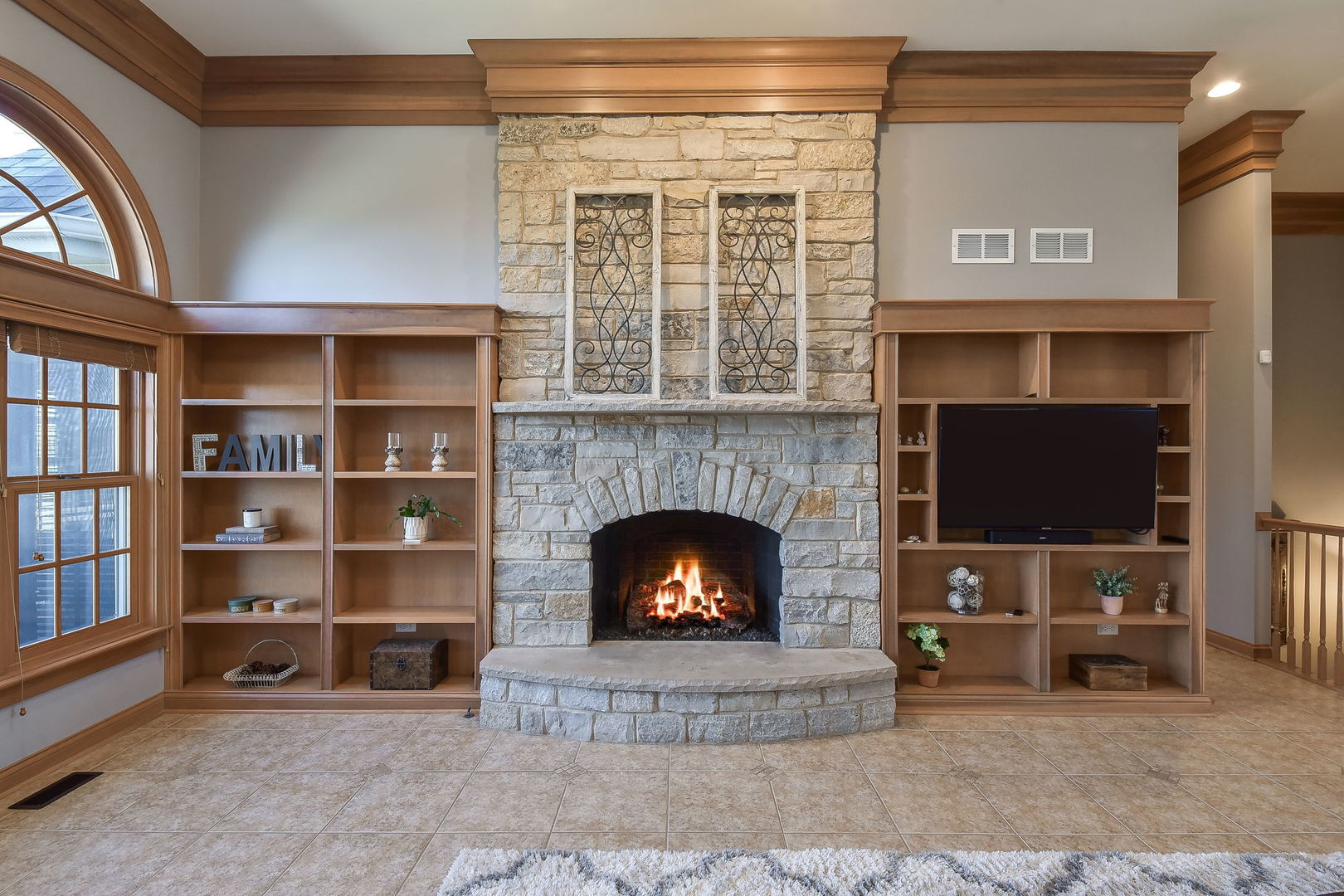 1737 Hunters Ridge Lane Sugar Grove, IL 60554 - Photo 9 of 50 a living room with furniture and a fireplace