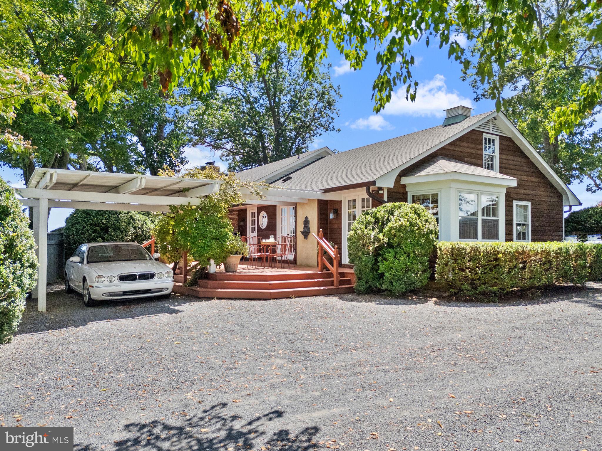 35771 Snake Hill Road Middleburg, VA 20117 - Photo 26 of 74 View of side deck w/carport off kitchen area