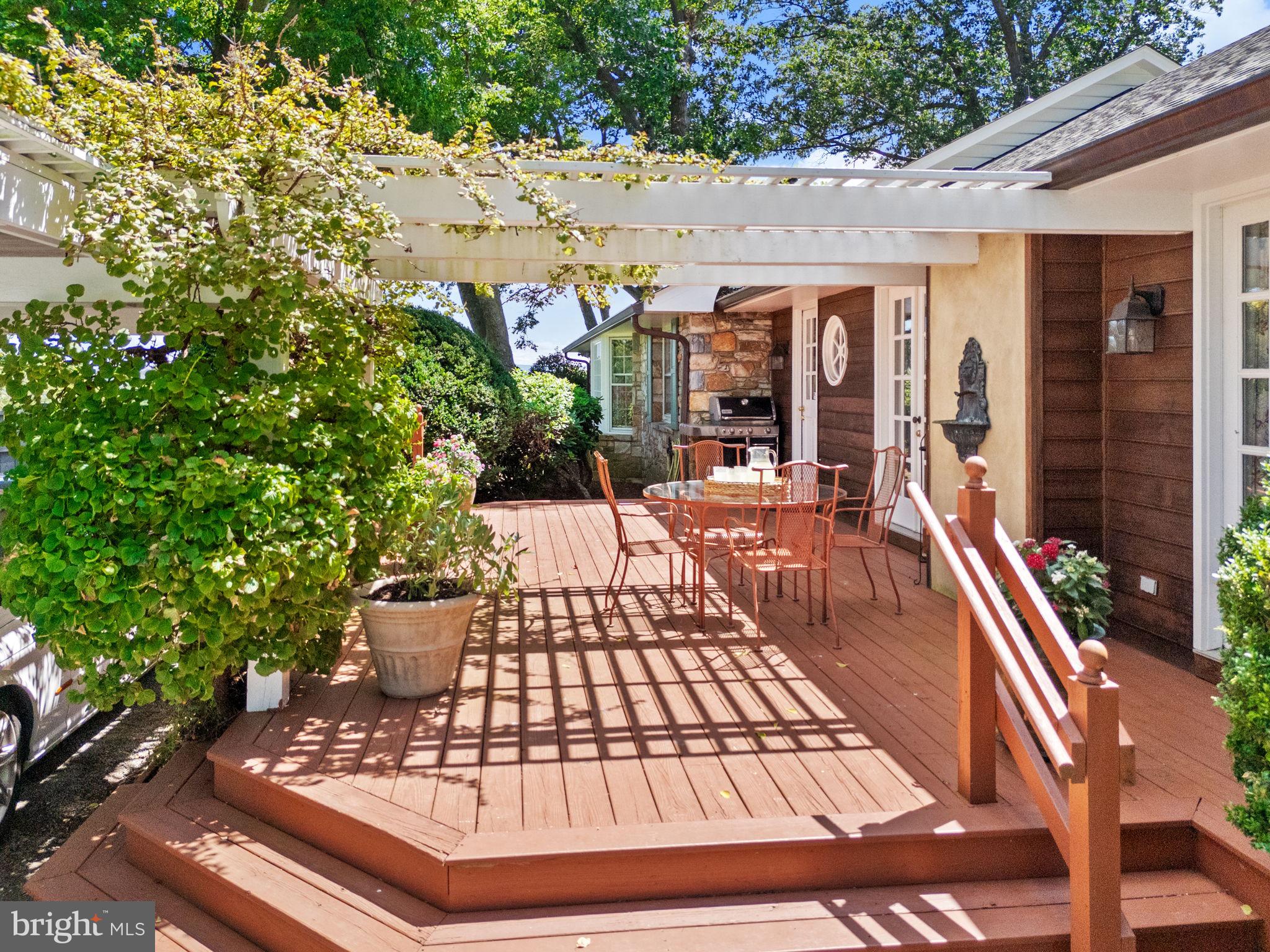 35771 Snake Hill Road Middleburg, VA 20117 - Photo 27 of 74 View of side deck with room for table & pergola