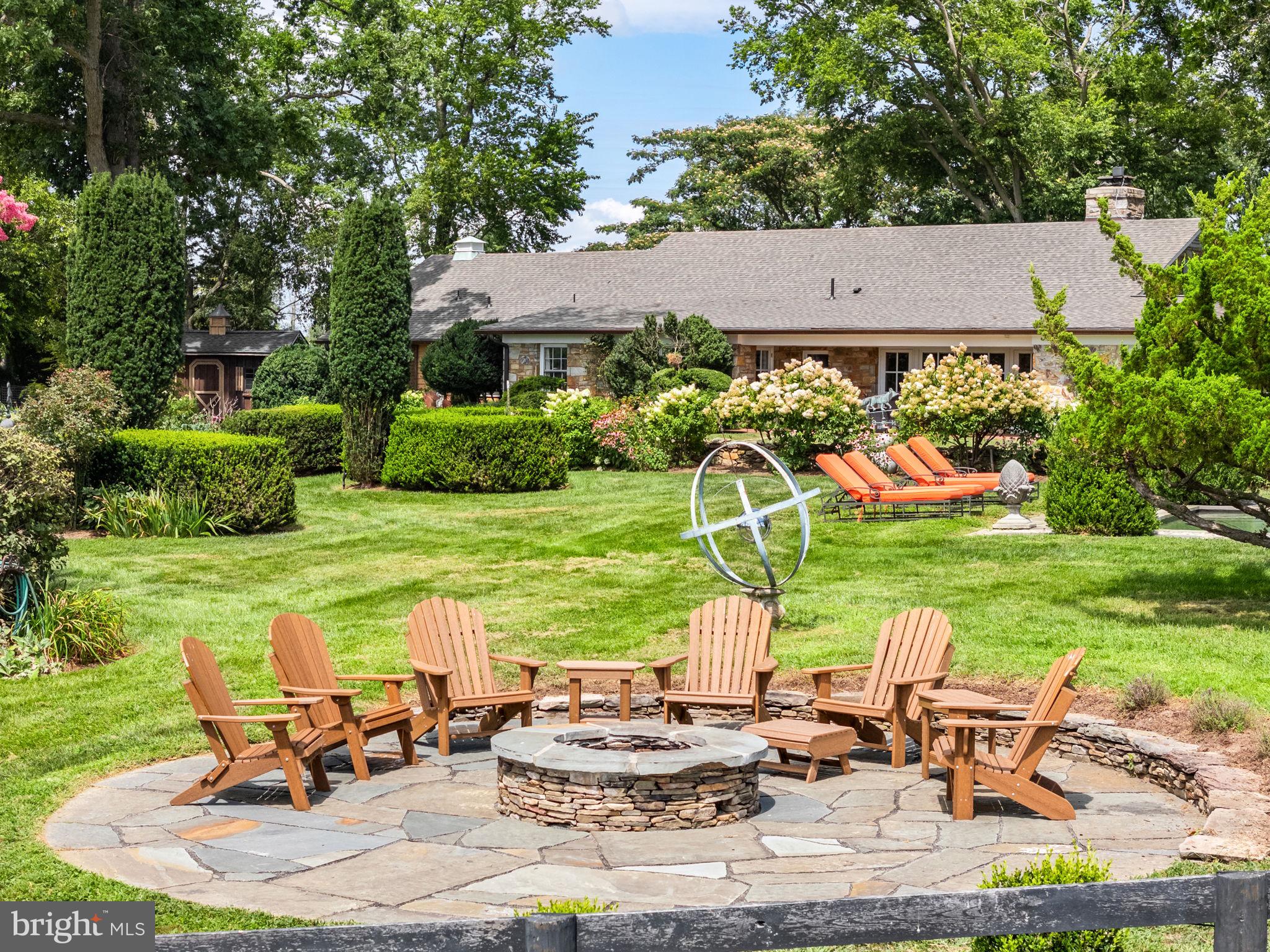 35771 Snake Hill Road Middleburg, VA 20117 - Photo 6 of 10 a view of a patio with table and chairs potted plants and swimming pool
