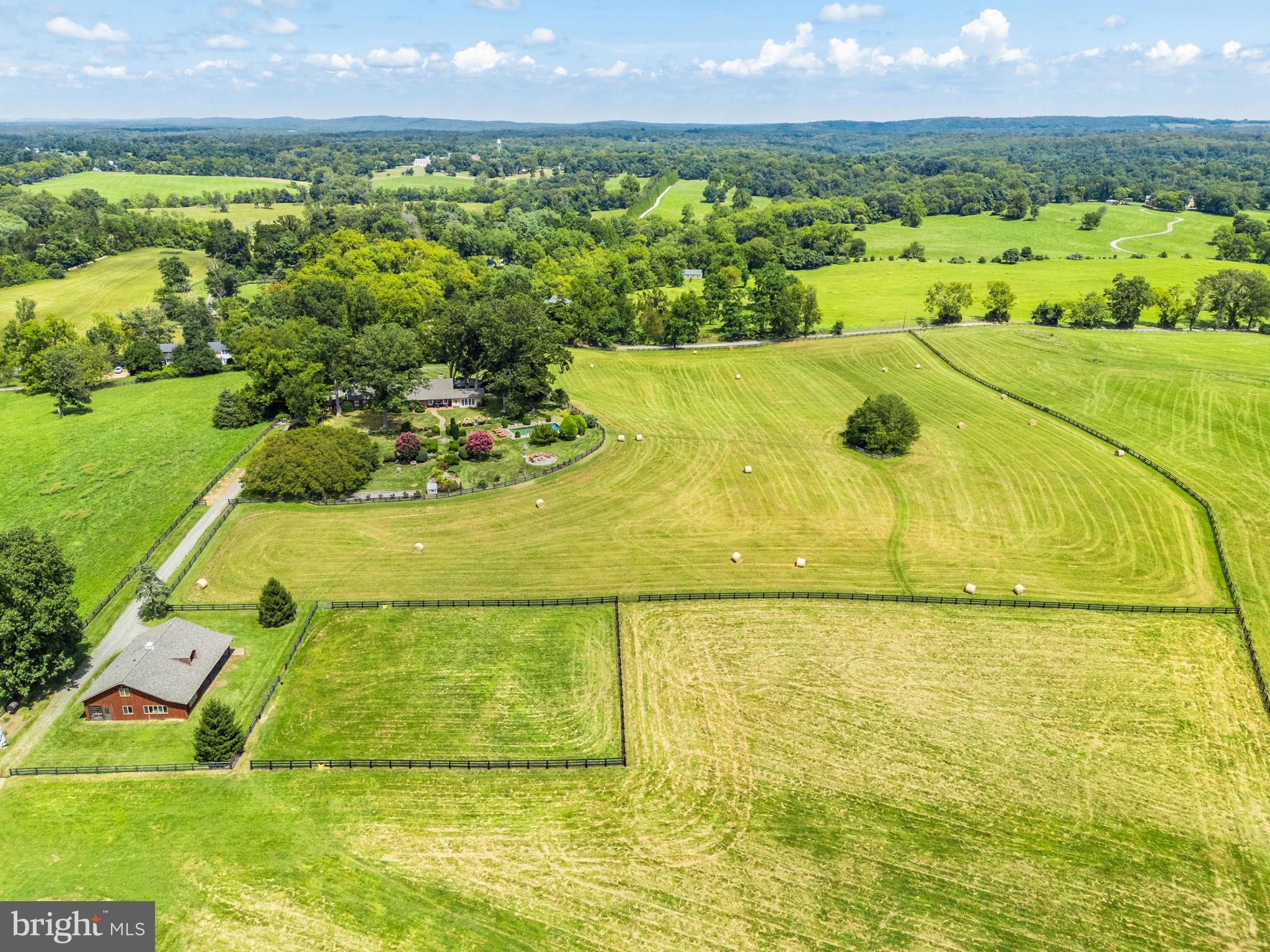 35771 Snake Hill Road Middleburg, VA 20117 - Photo 7 of 10 a view of a swimming pool with a yard