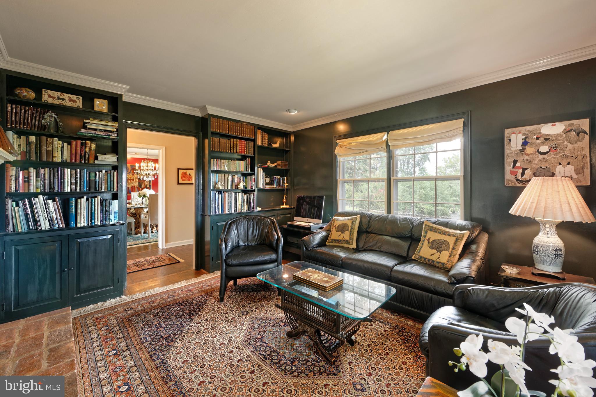 35771 Snake Hill Road Middleburg, VA 20117 - Photo 7 of 74 Cozy library has a wall of built-ins