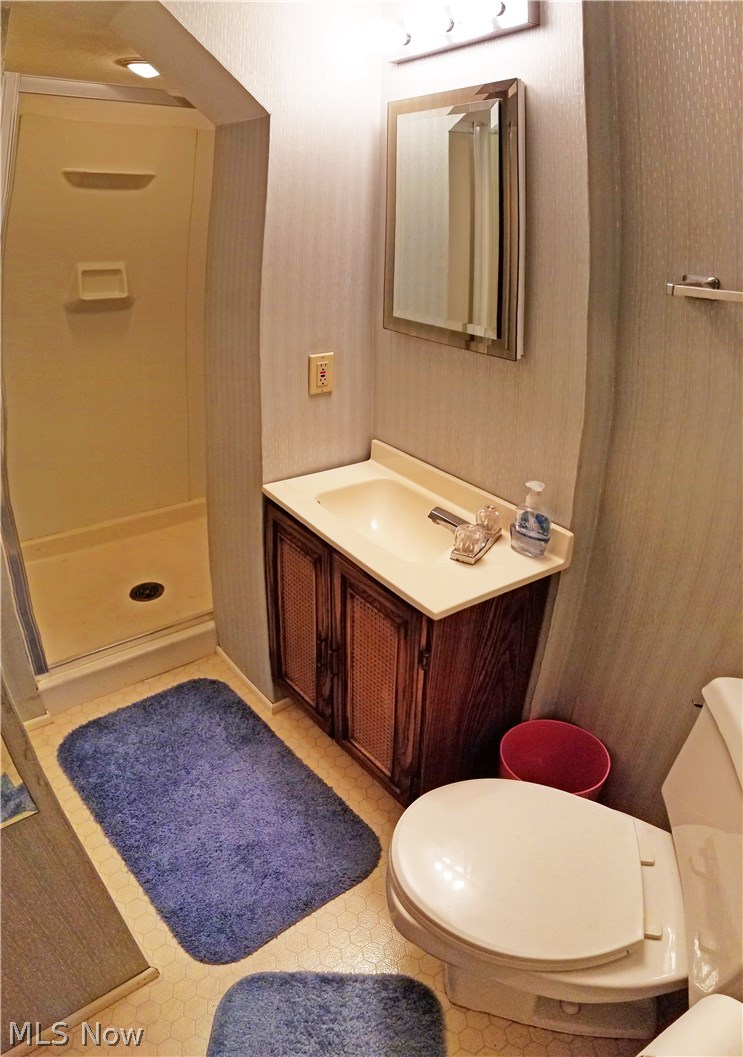 2888 Pressler Road Uniontown, OH 44685 - Photo 19 of 26 Lower level full bath with walk-in lighted shower.