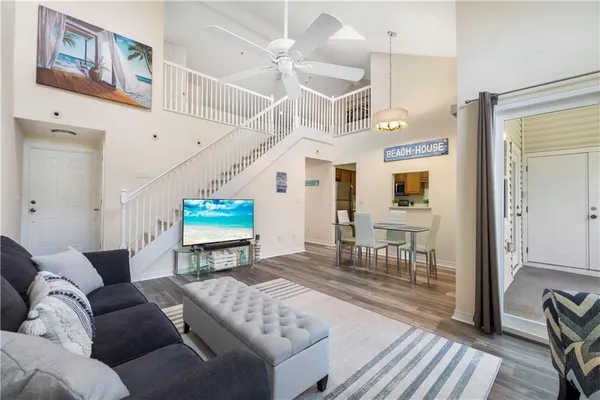 a living room with furniture and a table