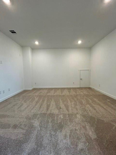 1833 Welsh Road Celina, TX 75009 - Photo 8 of 8 Spacious room featuring new carpeting, recessed lighting, white walls, white baseboards, and a white interior door