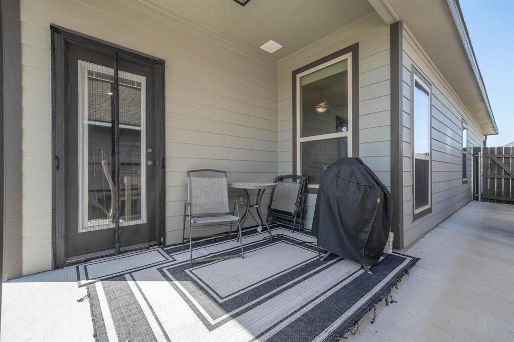 4009 Bravo Ranch Road Waco, TX 76705 - Photo 25 of 34 a room with gym equipment and a large window