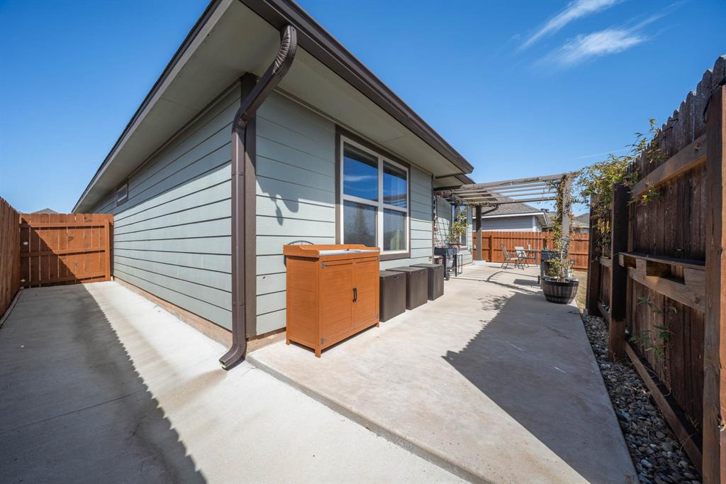 4009 Bravo Ranch Road Waco, TX 76705 - Photo 27 of 34 a view of a backyard with a patio