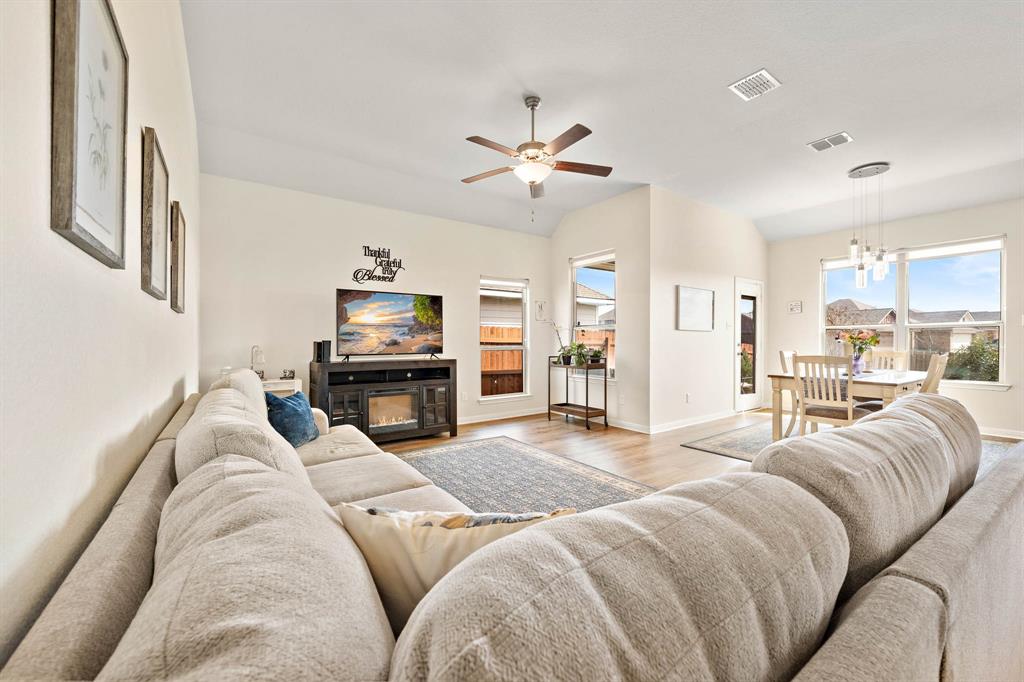 4009 Bravo Ranch Road Waco, TX 76705 - Photo 10 of 34 a living room with furniture and a flat screen tv