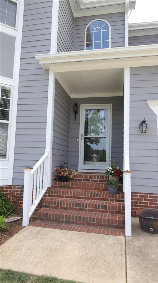 3820 Evander Way Raleigh, NC 27613 - Photo 3 of 30 It is great to have a covered entry to the home. There is a storm door as well. Porch