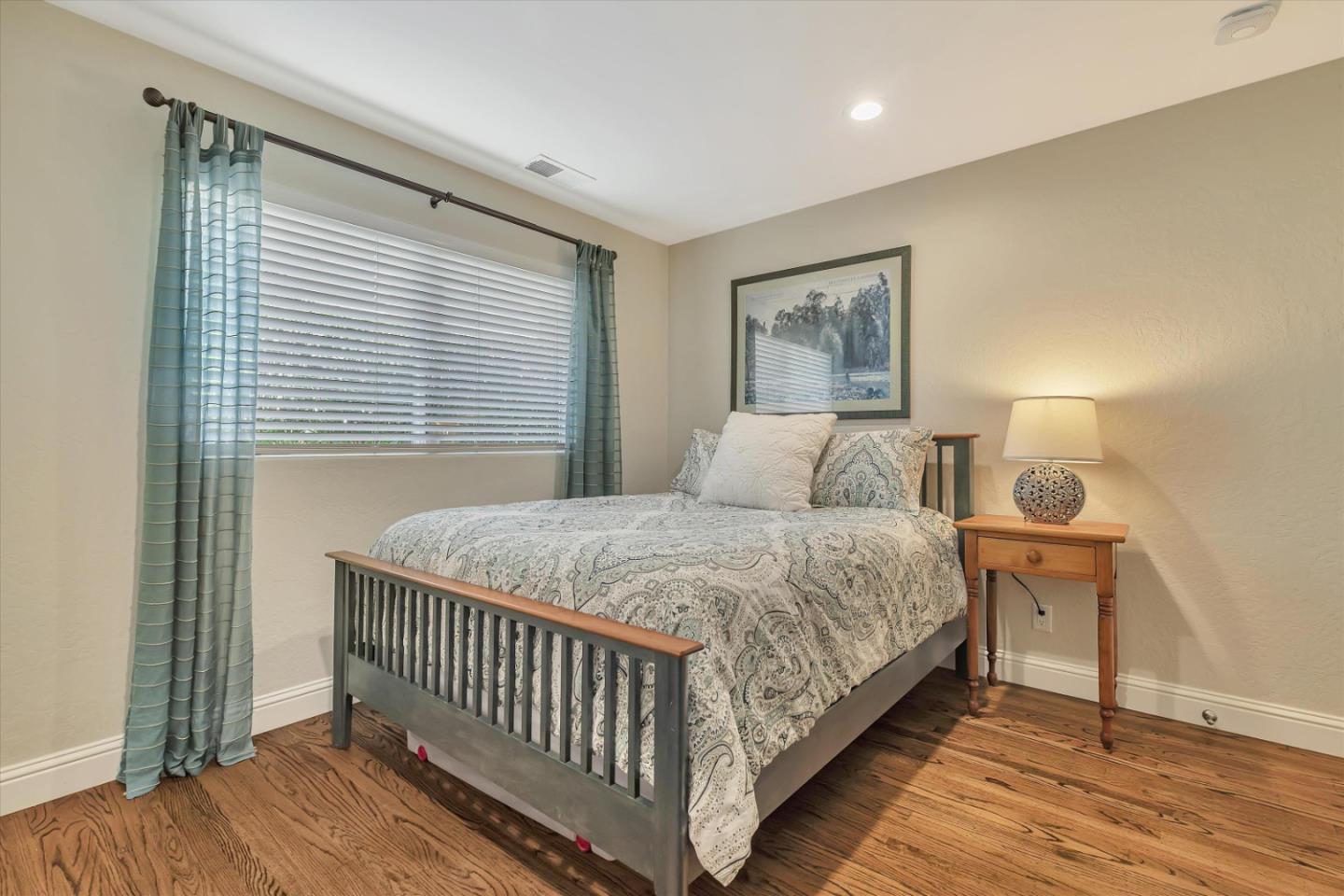 1190 Bruckner Circle Mountain View, CA 94040 - Photo 22 of 51 a bedroom with a bed and a window