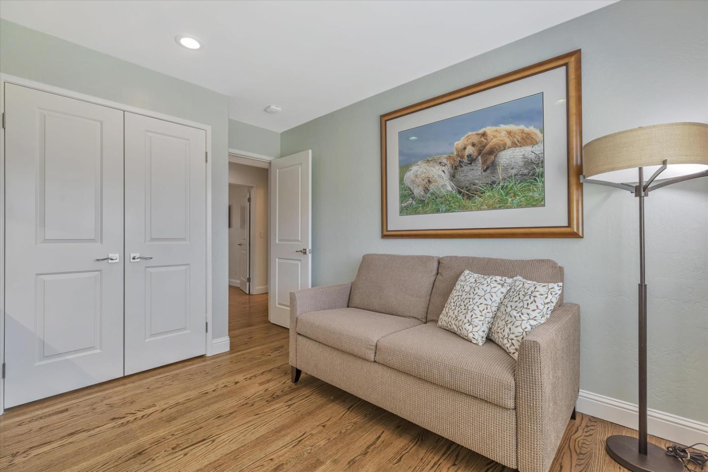 1190 Bruckner Circle Mountain View, CA 94040 - Photo 28 of 51 a living room with furniture and a painting on the wall