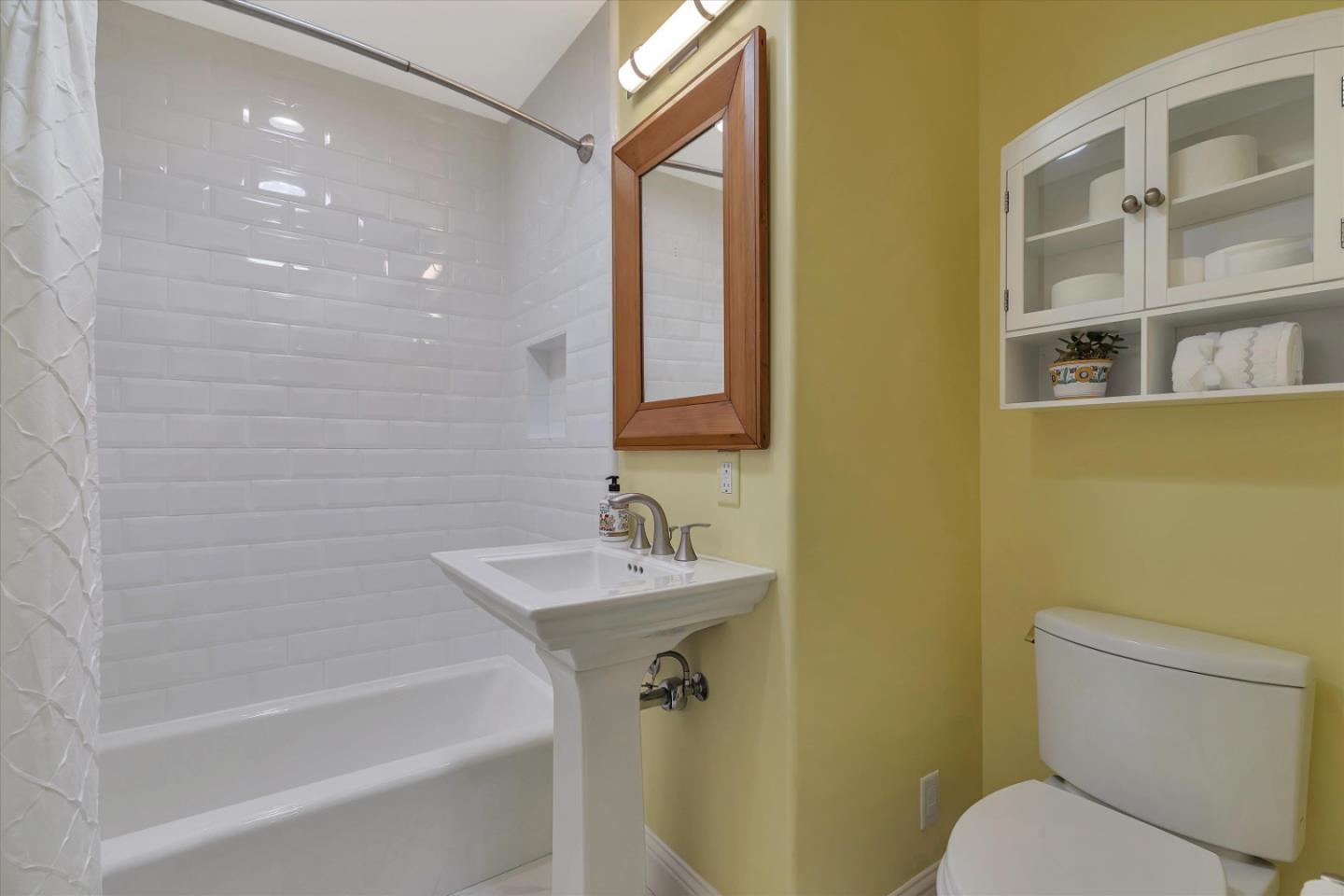 1190 Bruckner Circle Mountain View, CA 94040 - Photo 30 of 51 a bathroom with a sink a toilet and shower