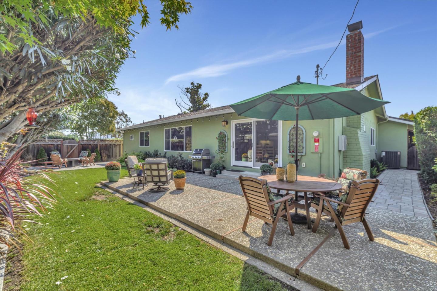 1190 Bruckner Circle Mountain View, CA 94040 - Photo 42 of 51 a view of a house with backyard sitting area and garden
