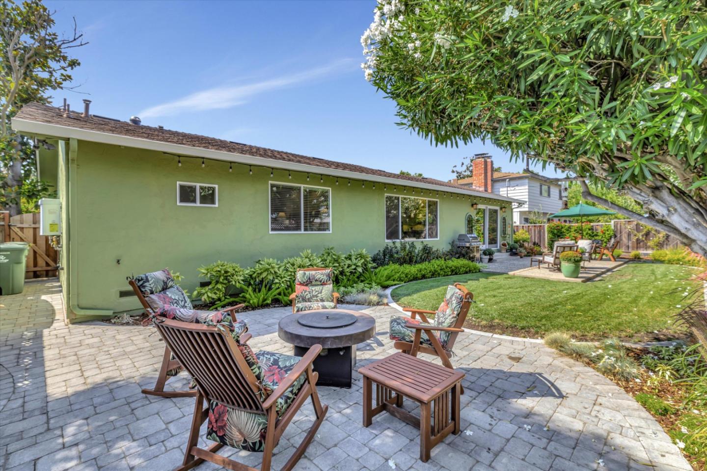 1190 Bruckner Circle Mountain View, CA 94040 - Photo 50 of 51 a view of a chair and table in backyard of the house