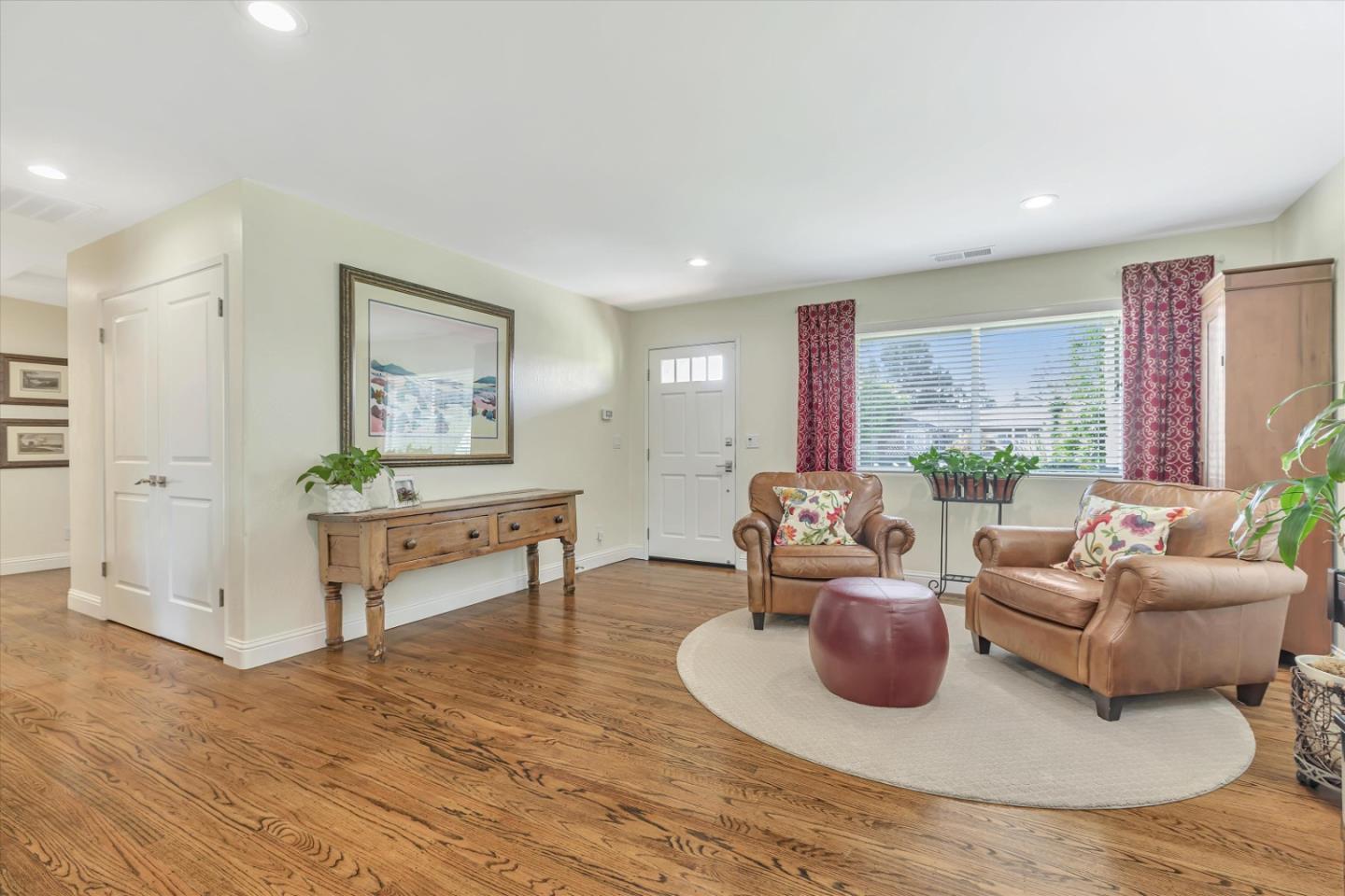 1190 Bruckner Circle Mountain View, CA 94040 - Photo 6 of 51 a living room with furniture and a wooden floor