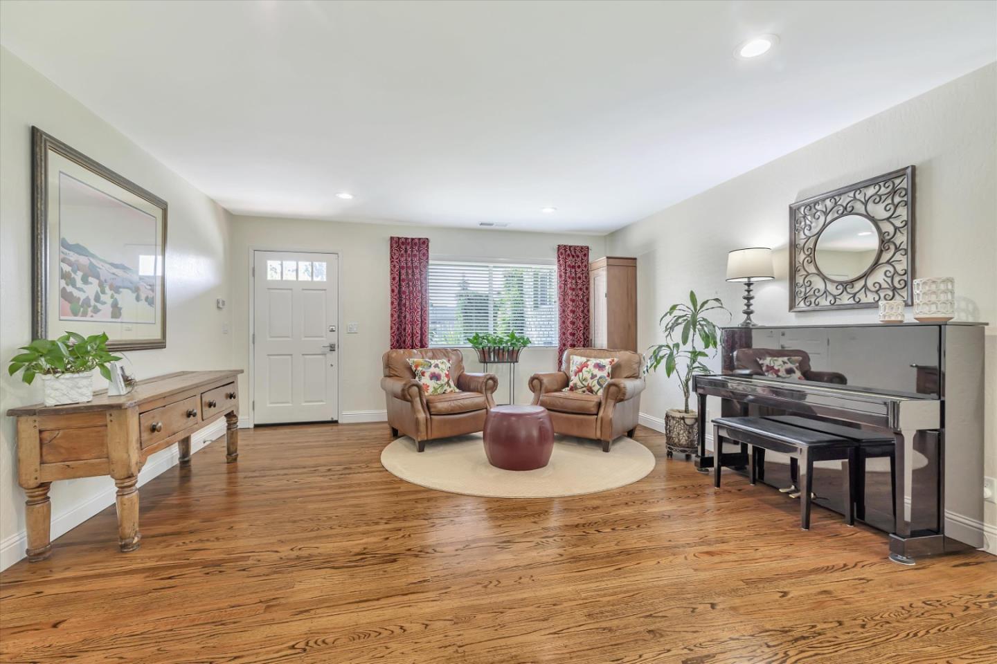 1190 Bruckner Circle Mountain View, CA 94040 - Photo 7 of 51 a living room with furniture and a wooden floor