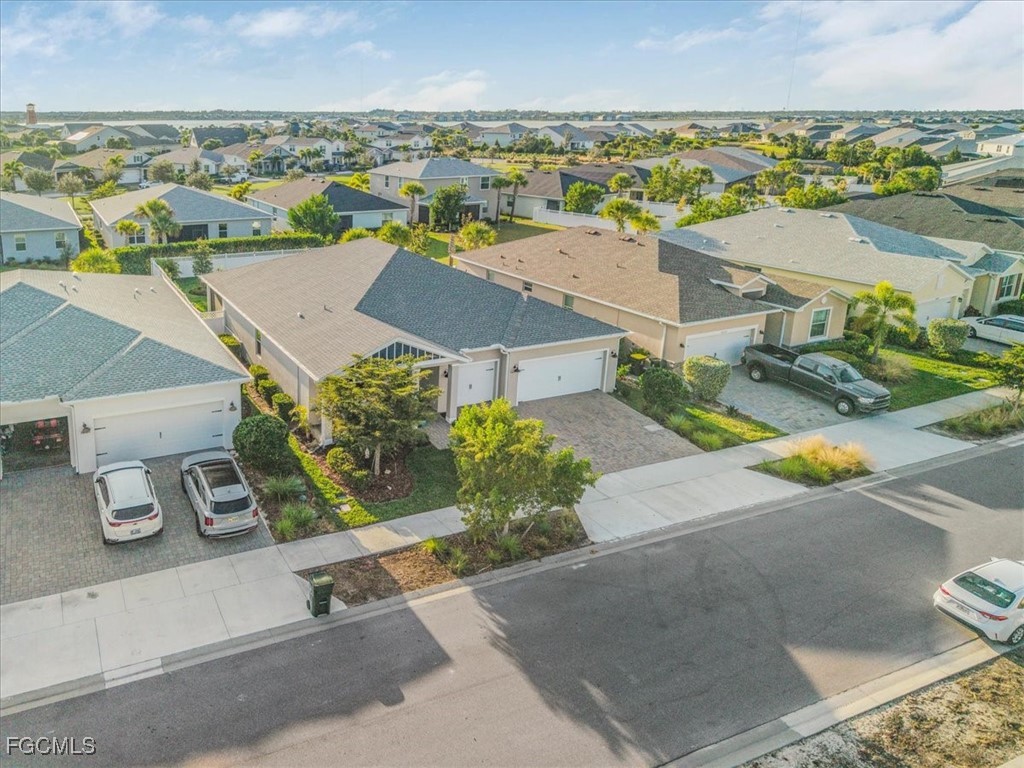 16128 Lotus Way Punta Gorda, FL 33982 - Photo 11 of 49 an aerial view of residential houses with outdoor space