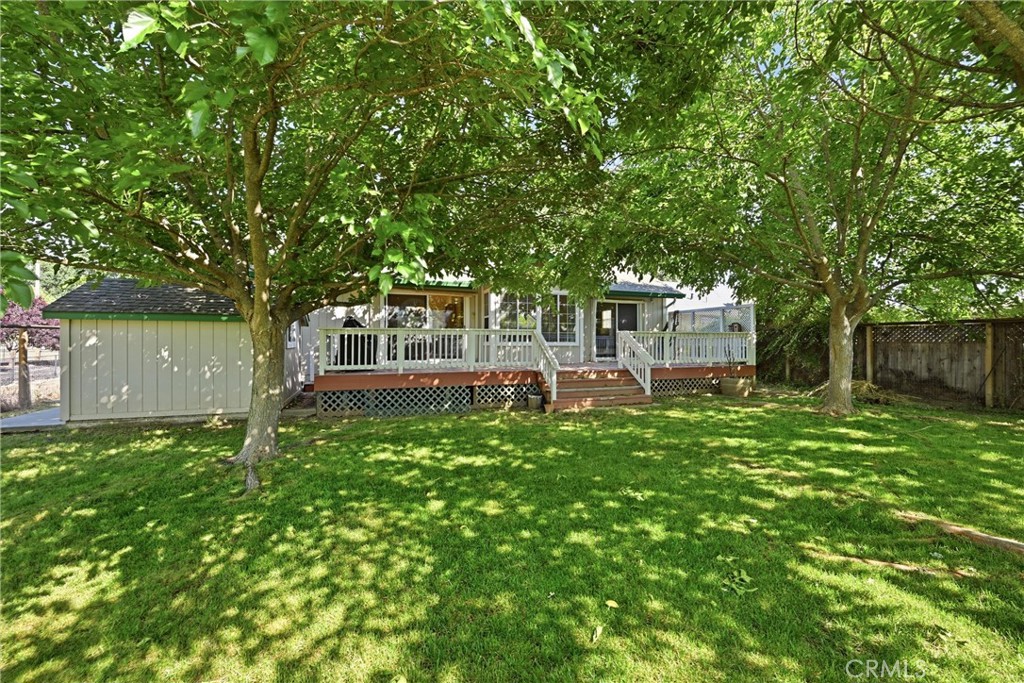 18846 Horseshoe Road Hidden Valley Lake, CA 95467 - Photo 27 of 31 a front view of a house with a garden