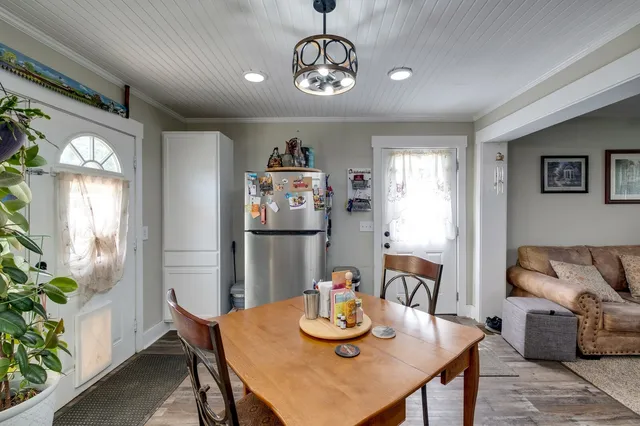 a view of a dining room with furniture