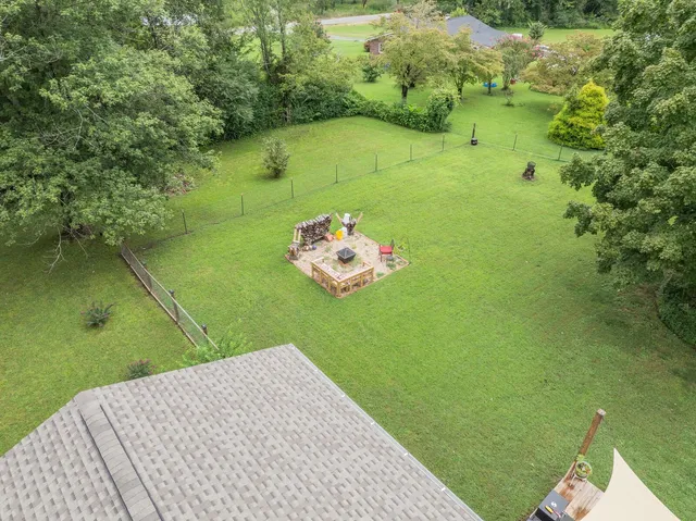 a balcony with table and chairs
