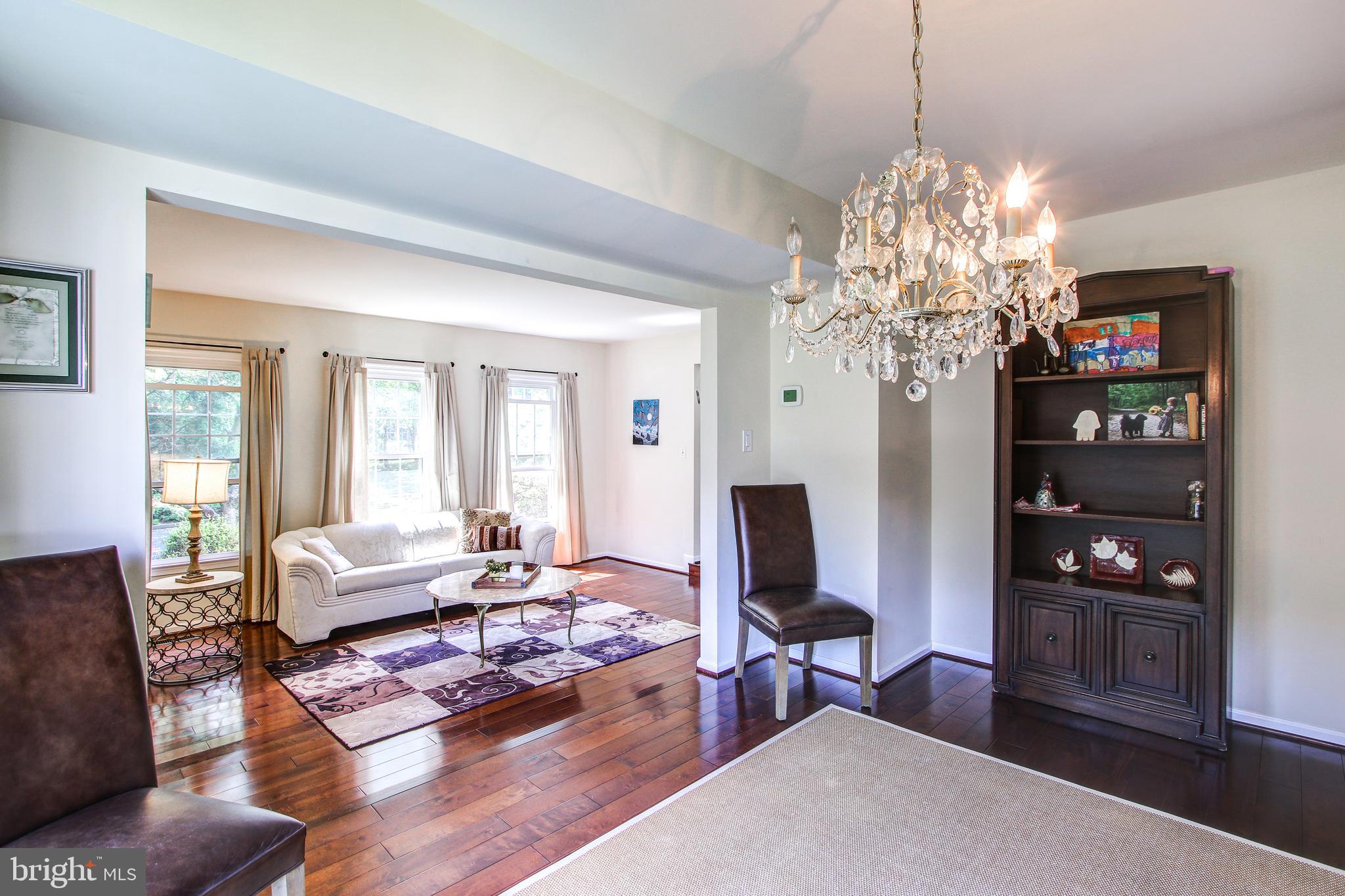 521 Ridgewell Way Silver Spring, MD 20902 - Photo 6 of 48 Dining room opens up to light filled living room.
