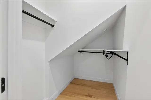 a view of a room with racks on the wall