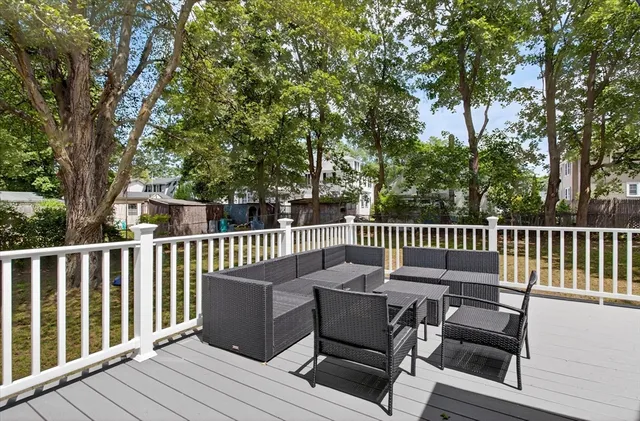a view of a two chairs on the roof deck
