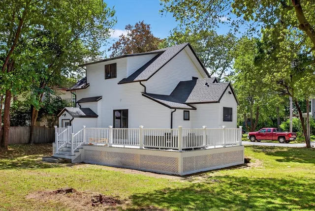 a front view of house with garden