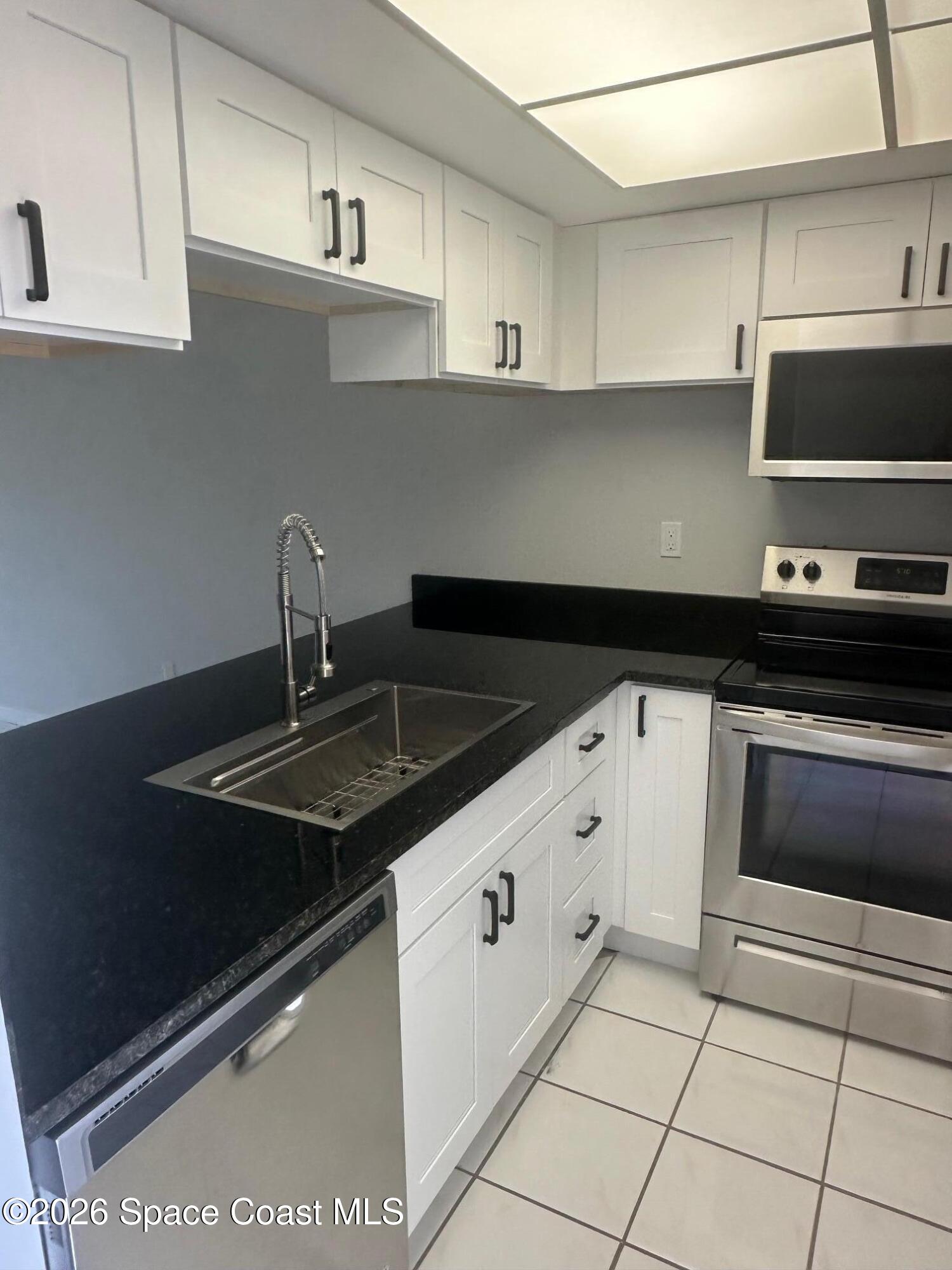 1720 Murrell Road, Unit 120 Rockledge, FL 32955 - Photo 3 of 24 IMG_4183