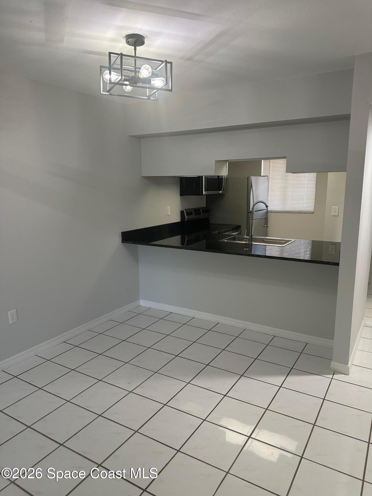 1720 Murrell Road, Unit 120 Rockledge, FL 32955 - Photo 9 of 24 IMG_4196