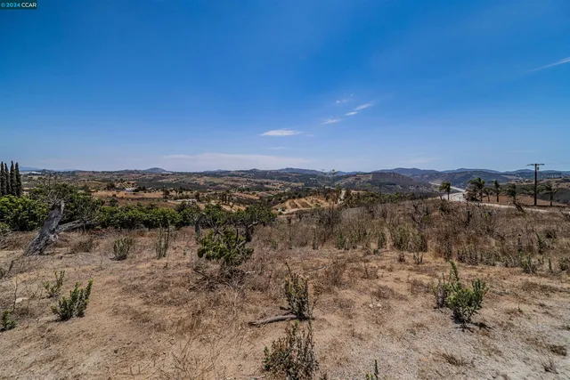 a view of mountains and mountain in the back