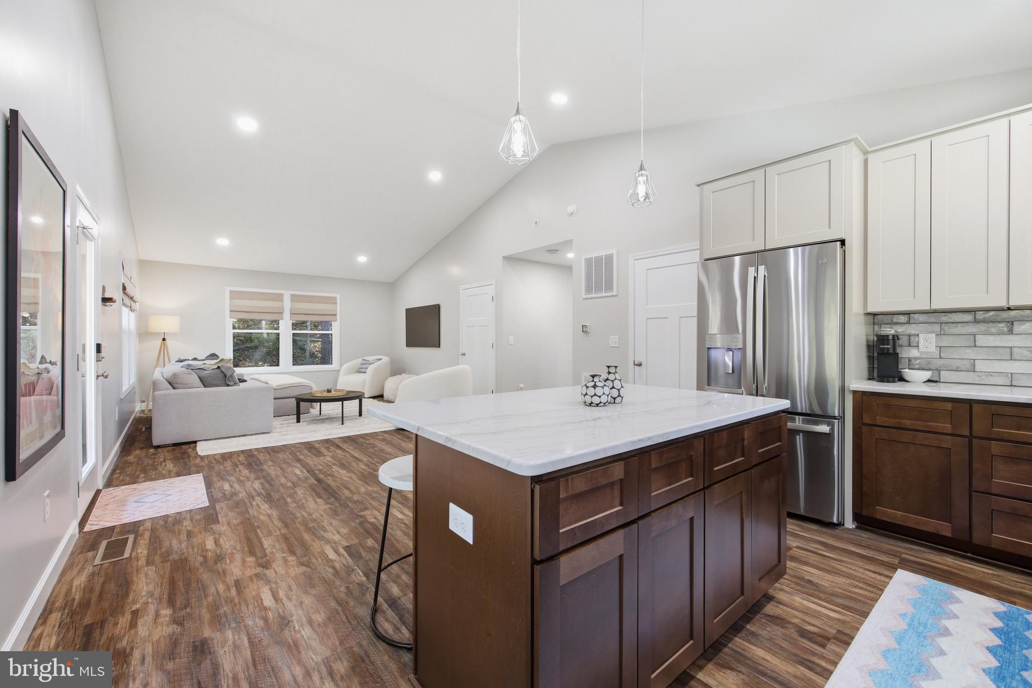 395 Deloris Road Mount Jackson, VA 22842 - Photo 16 of 48 a kitchen with kitchen island a sink stove and refrigerator