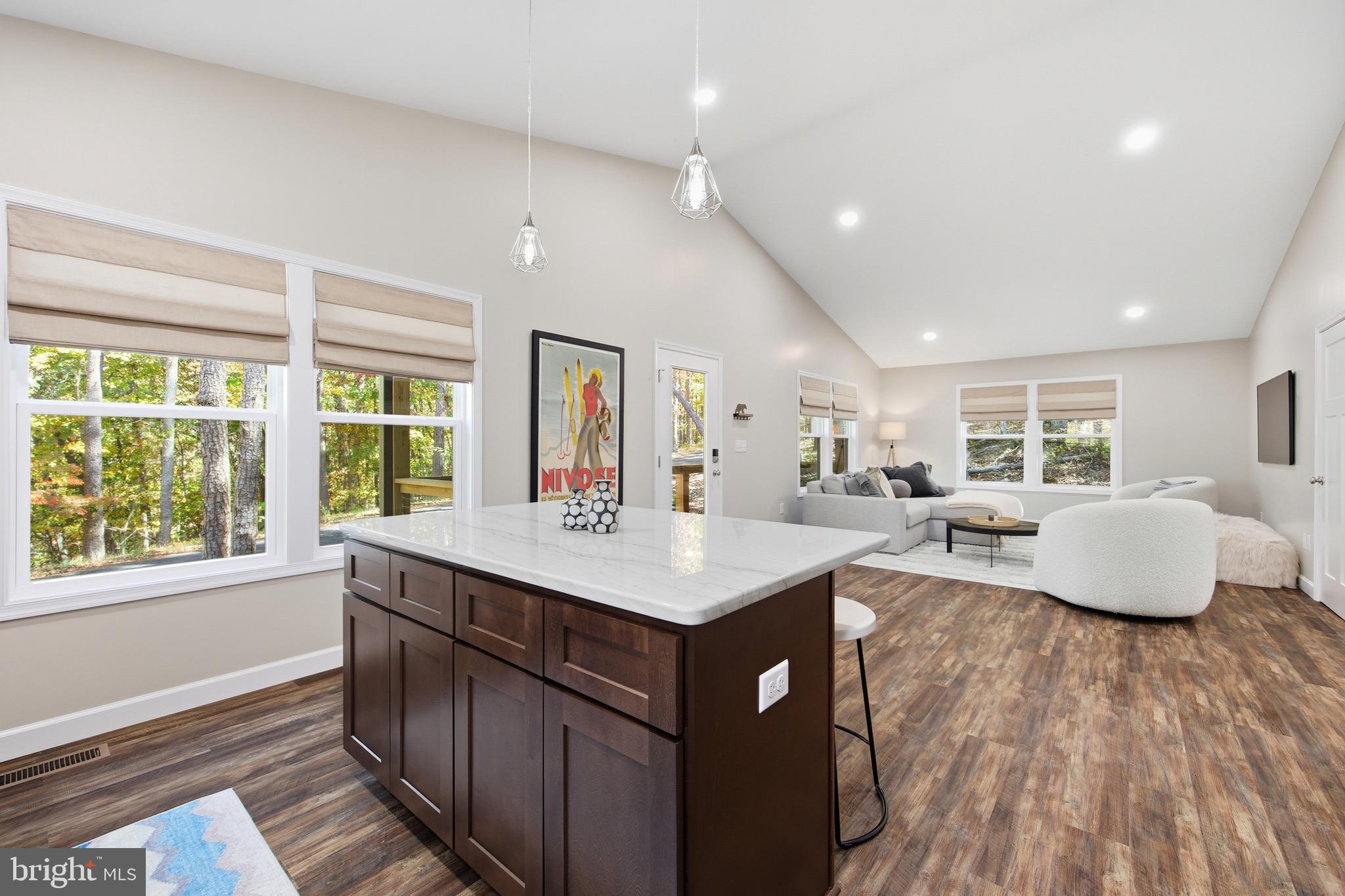 395 Deloris Road Mount Jackson, VA 22842 - Photo 17 of 48 a living room with stainless steel appliances granite countertop sink stove and wooden floor