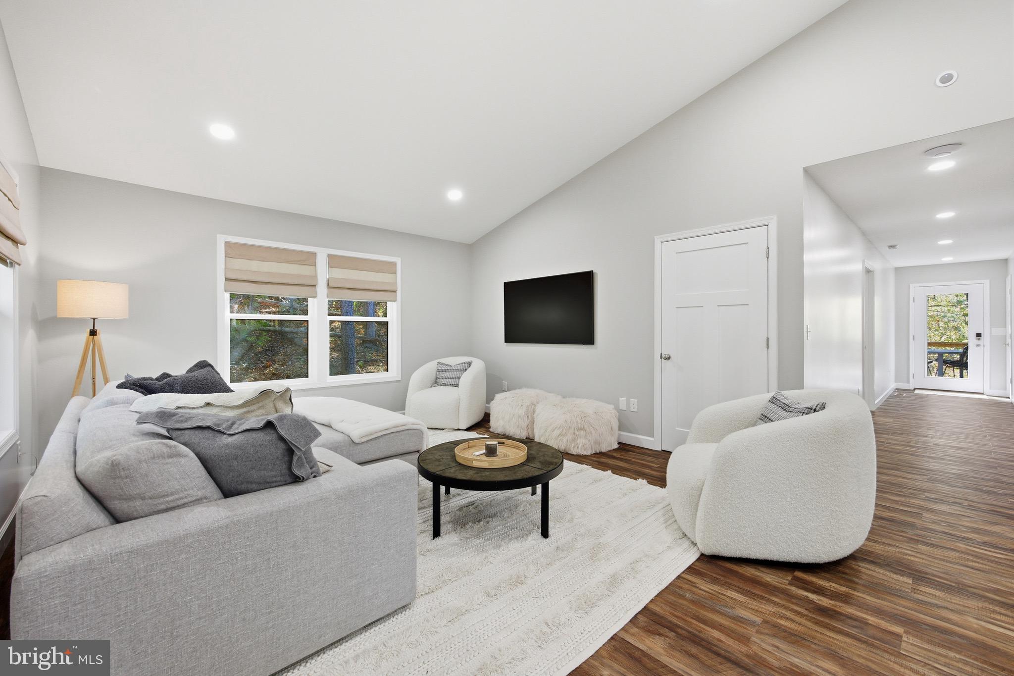 395 Deloris Road Mount Jackson, VA 22842 - Photo 18 of 48 a living room with furniture and a large window