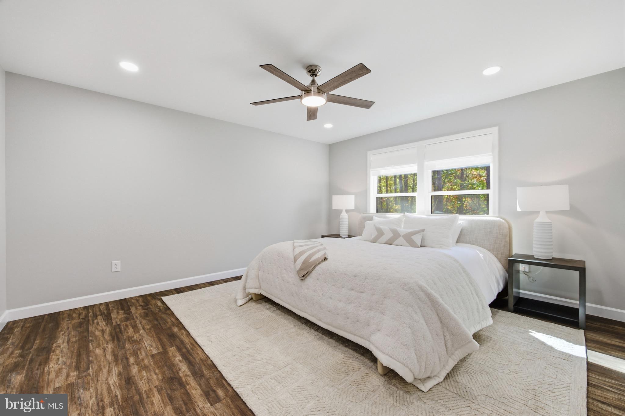 395 Deloris Road Mount Jackson, VA 22842 - Photo 21 of 48 a bedroom with a bed and window