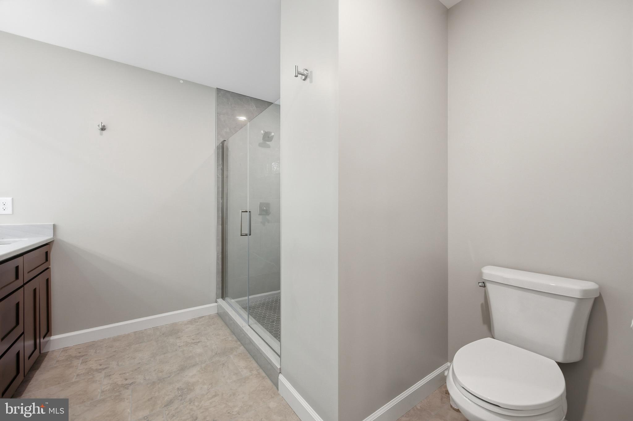 395 Deloris Road Mount Jackson, VA 22842 - Photo 25 of 48 a white toilet sitting next to a shower